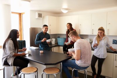 students-relaxing-in-kitchen-of-shared-accommodati-2023-11-27-05-06-47-utc (1)