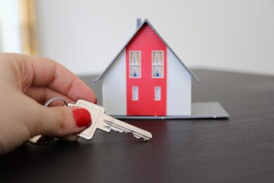 model of house with keys